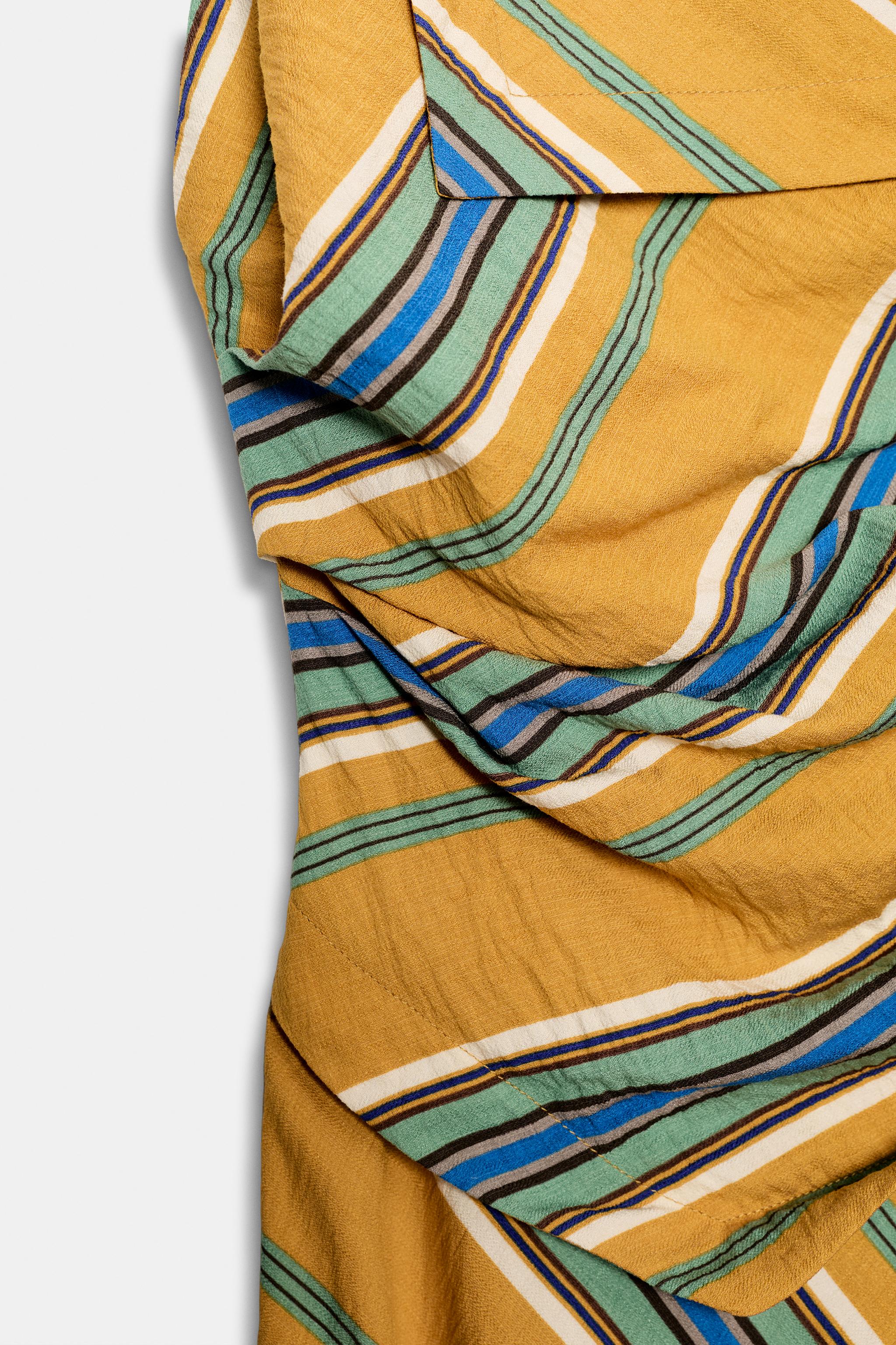 ROBE MI-LONGUE ASYMÉTRIQUE À RAYURES